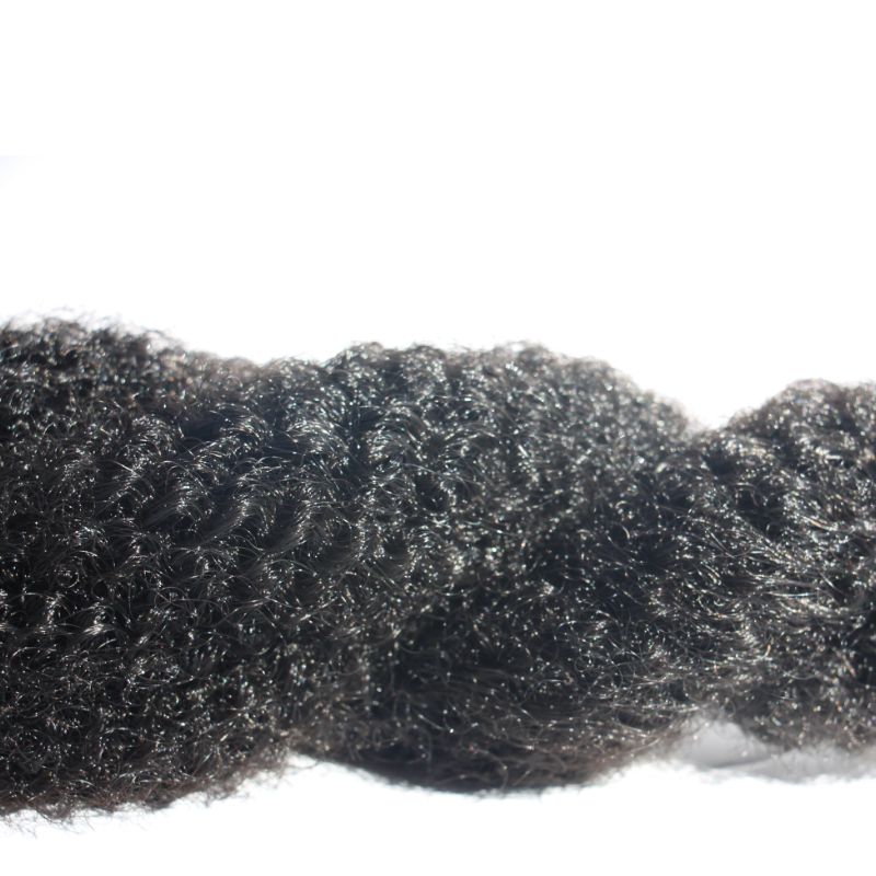 CITY AFRO 36-inch wig by The Damn Salon, featuring long, natural kinky textures inspired by Runway Curls.