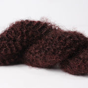 CITY AFRO 36-inch wig by The Damn Salon, featuring long, natural kinky textures inspired by Runway Curls.